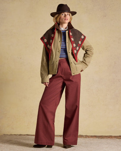 Tan Brown coloured Joules Barn Jacket on tan background 