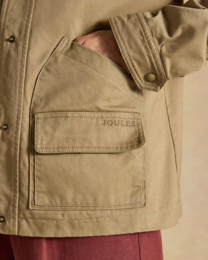 Tan Brown coloured Joules Barn Jacket on tan background 