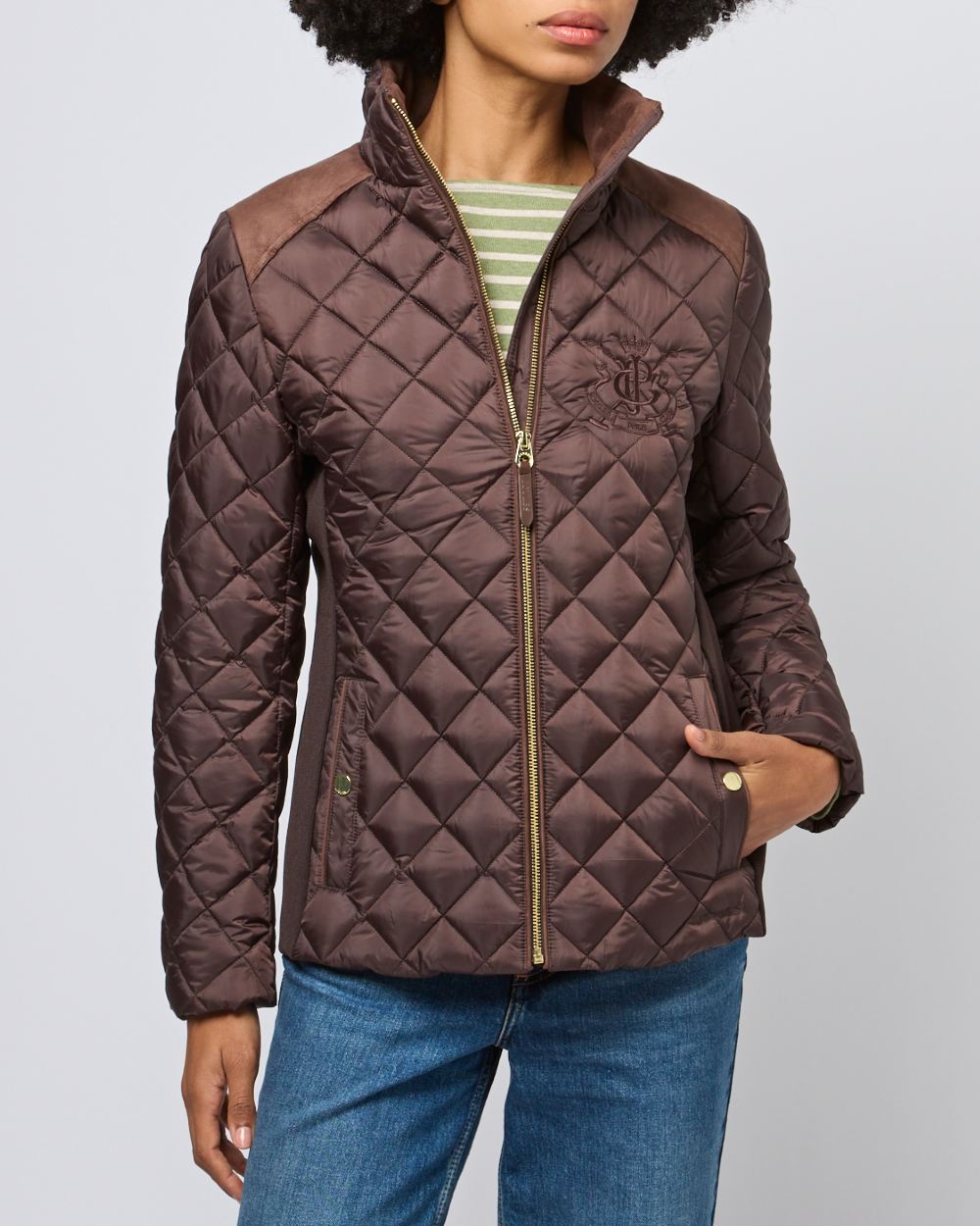 Chocolate Brown coloured Joules Braemar Luxe Jacket on grey background 