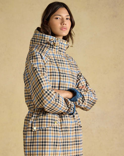 Brown Check Coloured Joules Everdry Waterproof Packable Raincoat on Beige Background 