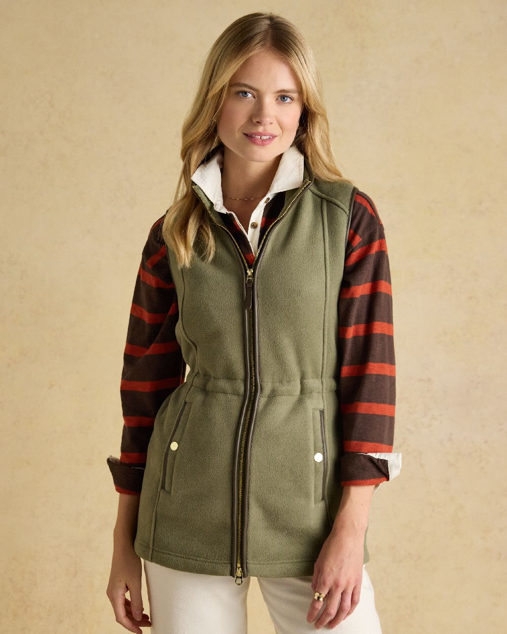 Light Green coloured Joules Heritage Longline Gilet on tan background 
