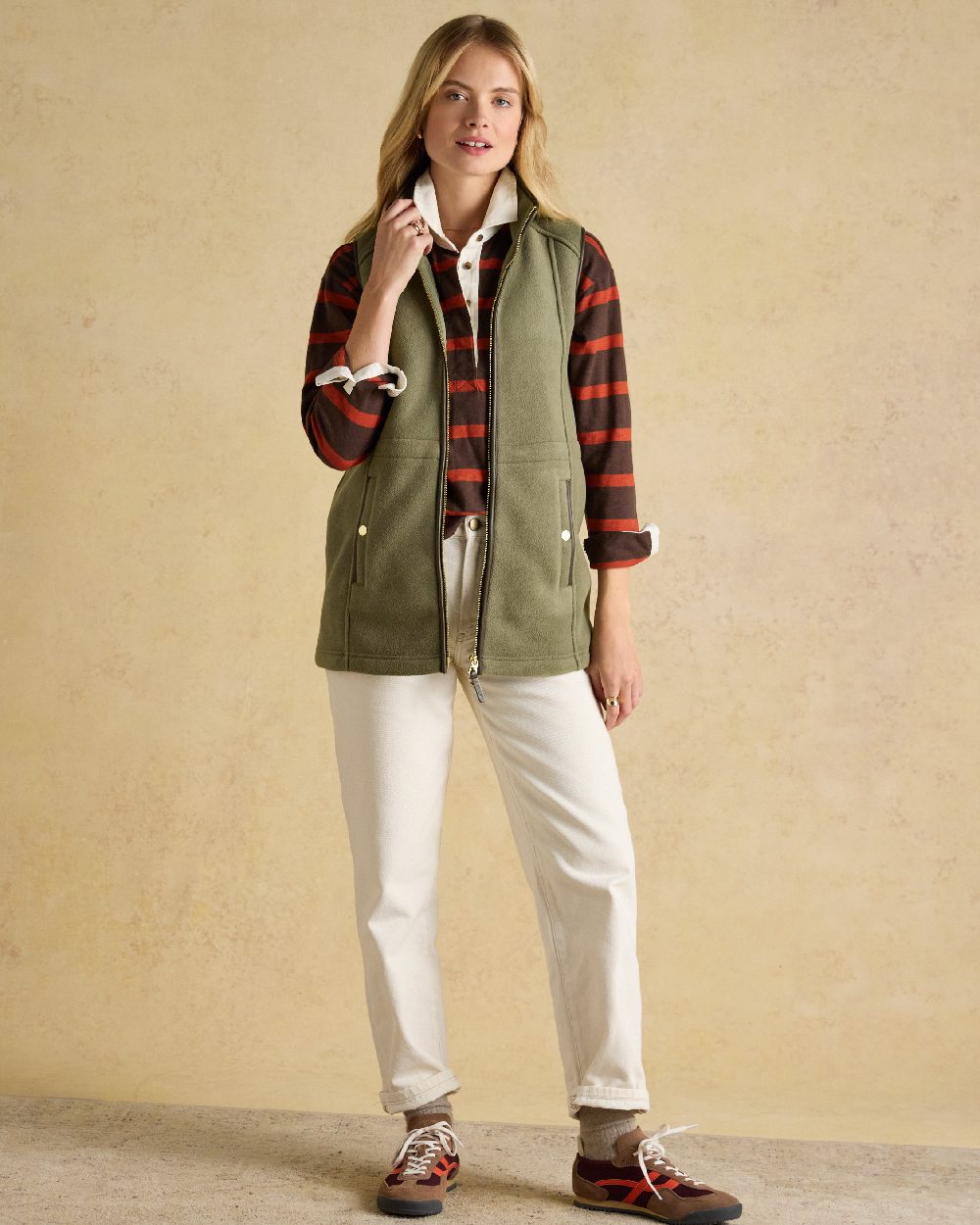 Light Green coloured Joules Heritage Longline Gilet on tan background 