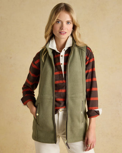 Light Green coloured Joules Heritage Longline Gilet on tan background 