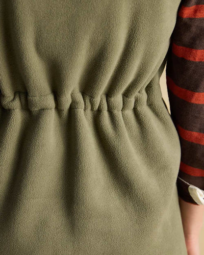 Light Green coloured Joules Heritage Longline Gilet on tan background 