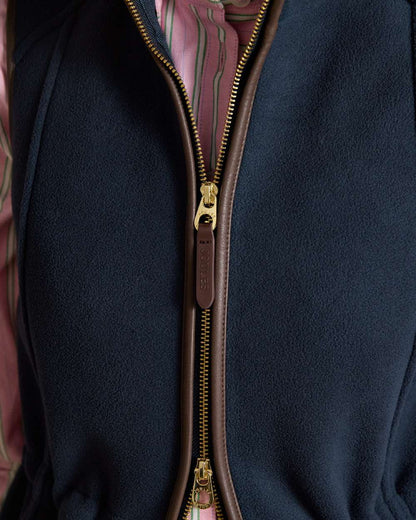 Navy Blue coloured Joules Heritage Longline Gilet on tan background 