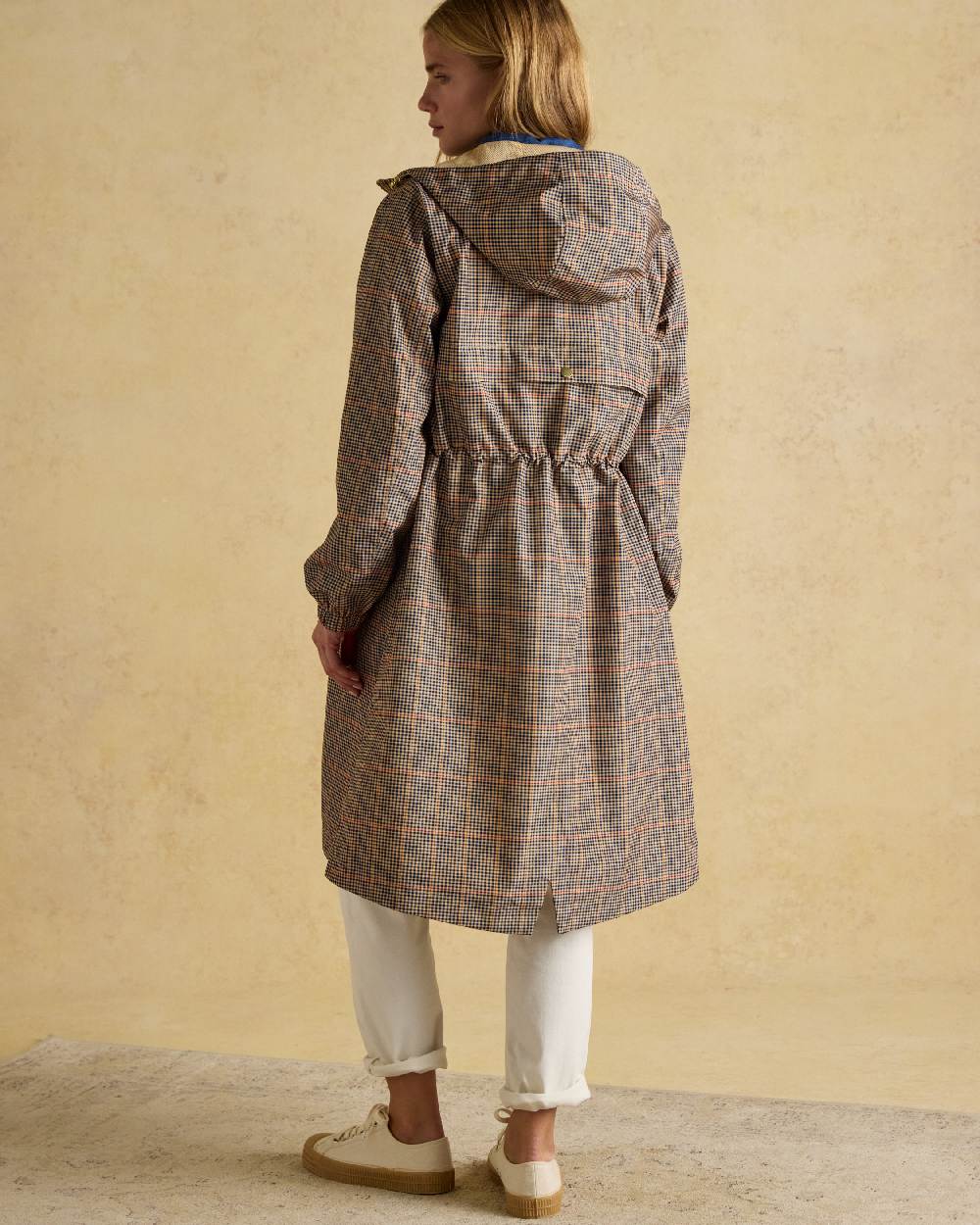 Henson Check Coloured Joules Holkham Waterproof Packable Raincoat With Hood on indoor background 