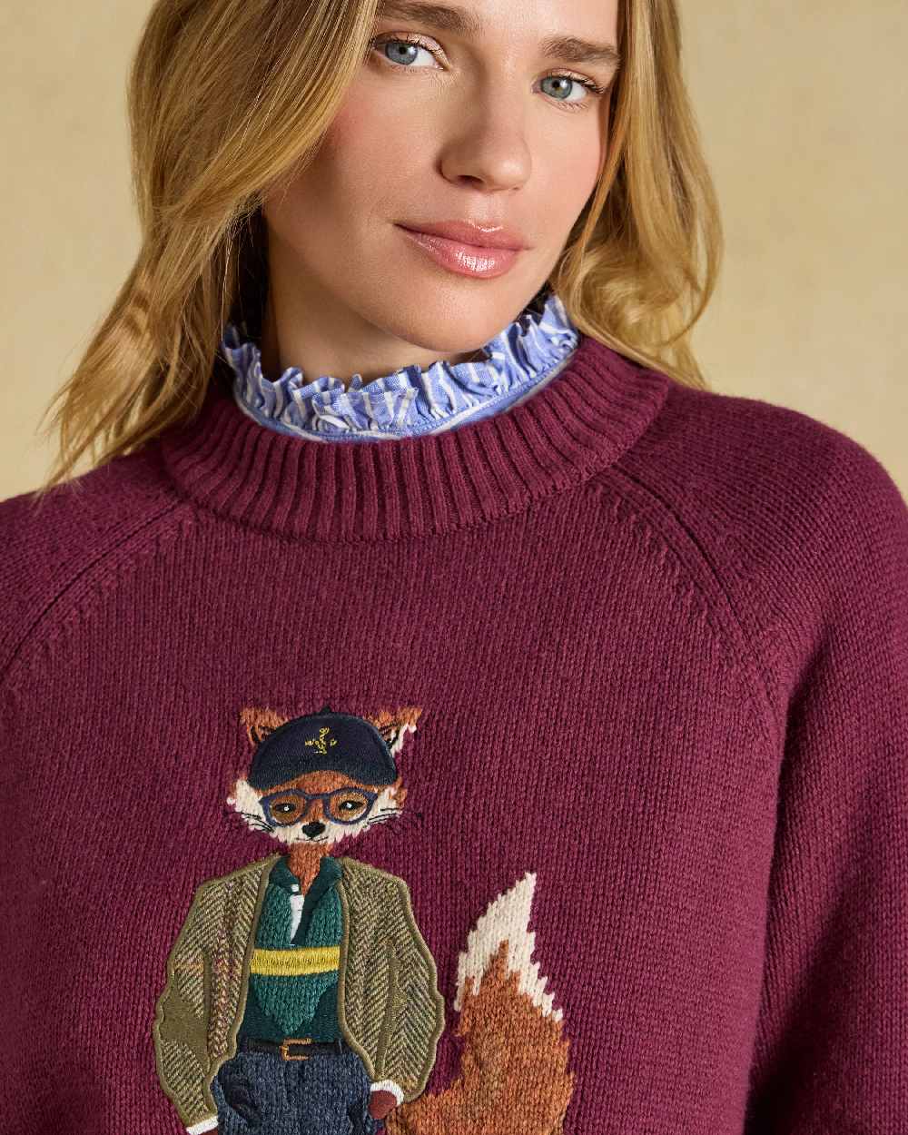 Burgundy Red Coloured Joules Jonty Intarsia Knit Jumper on beige background 