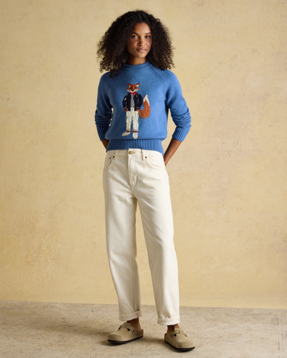Mariner Blue Coloured Joules Jonty Intarsia Knit Jumper on wall background 
