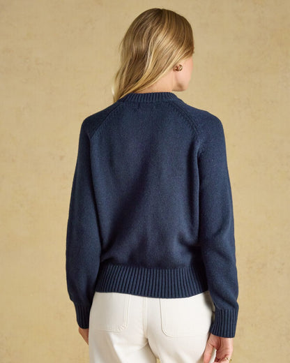 Navy Coloured Joules Jonty Intarsia Knit Jumper on beige background 