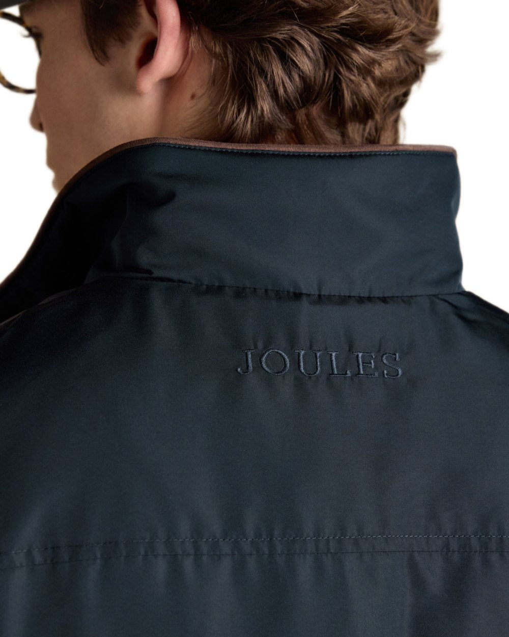 Navy coloured Joules Mens Farnham Padded Fleece Lined Gilet on white background 