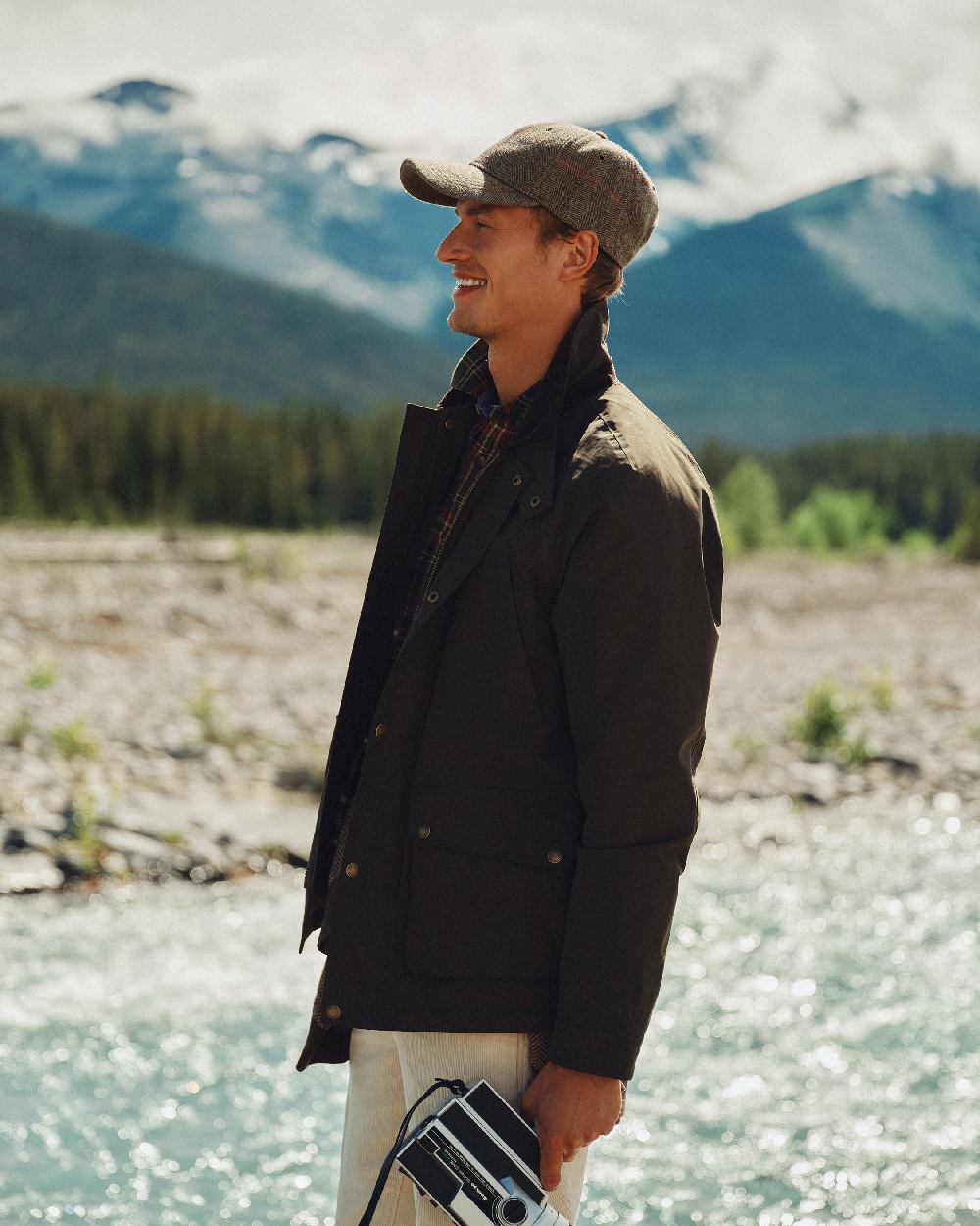Green Coloured Joules Mens Fraser Field Coat On Mountain Landscape Background 