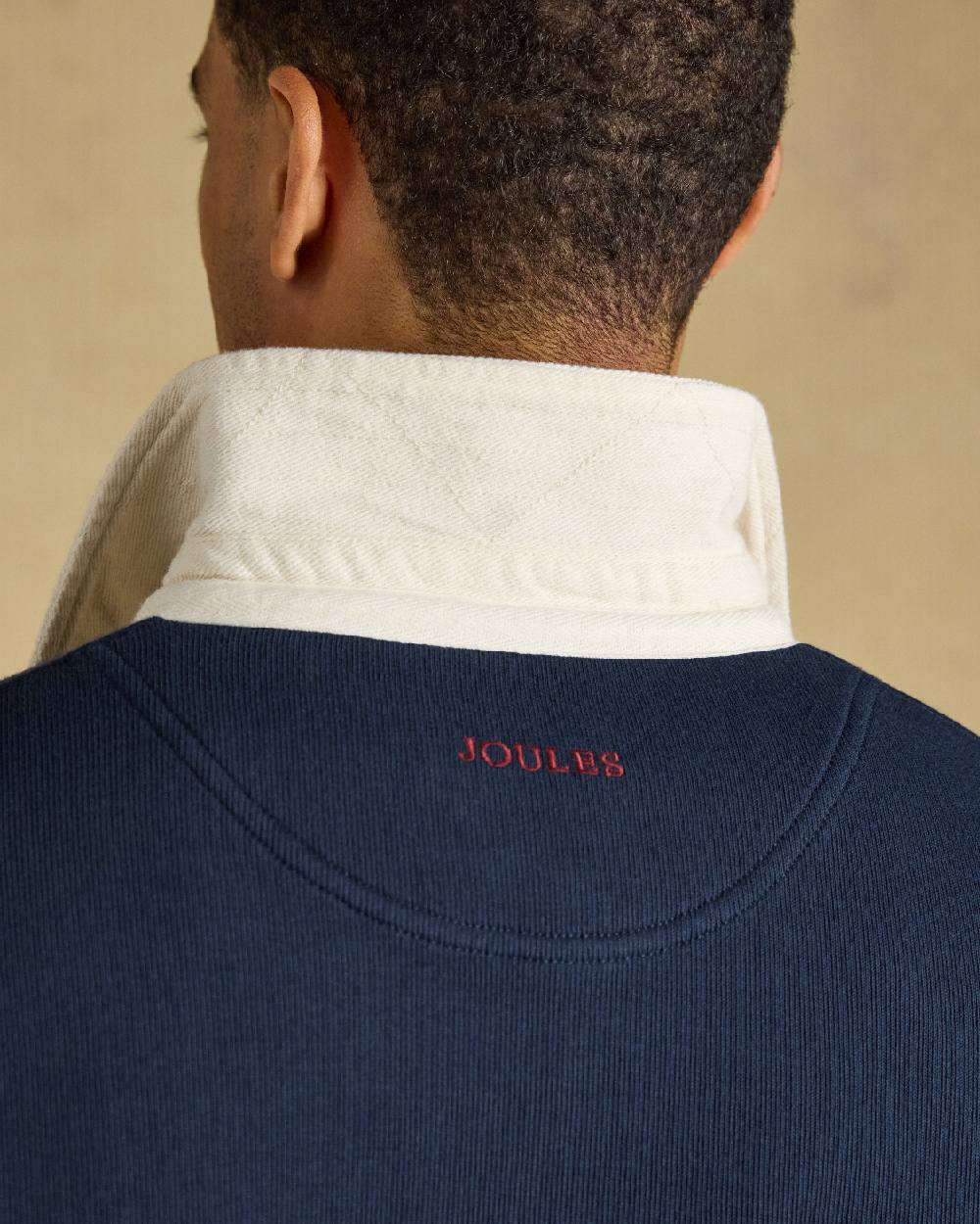 Green Navy Coloured Joules Mens French Rib Rugby Long Sleeve Sweatshirt on Beige Background 