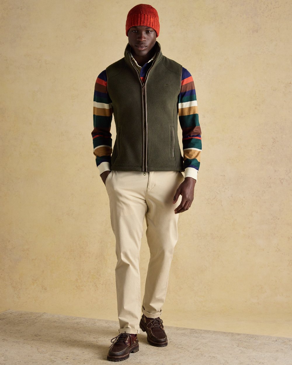 Green Coloured Joules Mens Heritage Fleece Gilet on indoor background 