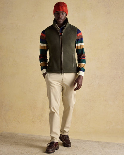 Green Coloured Joules Mens Heritage Fleece Gilet on indoor background 