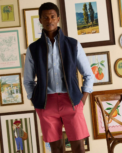 Navy Coloured Joules Mens Heritage Fleece Gilet on indoor background 