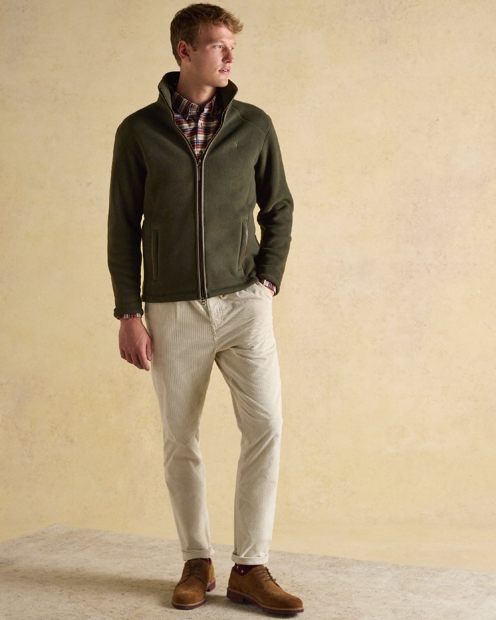 Dark Green Coloured Joules Mens Heritage Full Zip Through Fleece on indoor background 