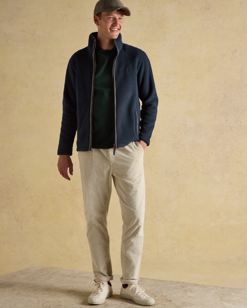 Navy Coloured Joules Mens Heritage Full Zip Through Fleece on indoor background 