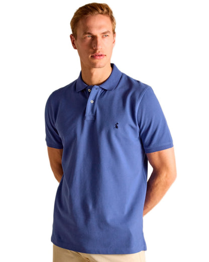 Blue coloured Joules Mens Woody Cotton Pique Polo Shirt on white background 