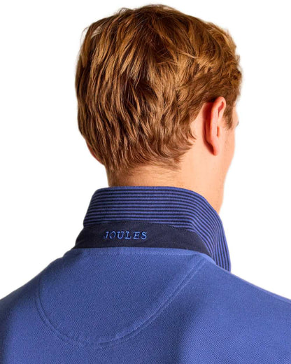 Blue coloured Joules Mens Woody Cotton Pique Polo Shirt on white background 