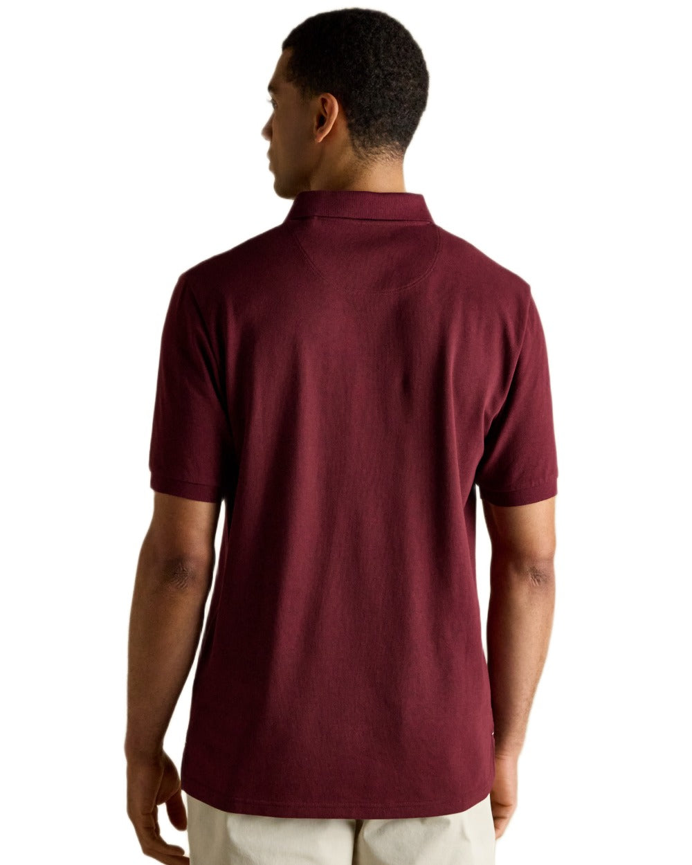 Burgundy coloured Joules Mens Woody Cotton Pique Polo Shirt on white background 