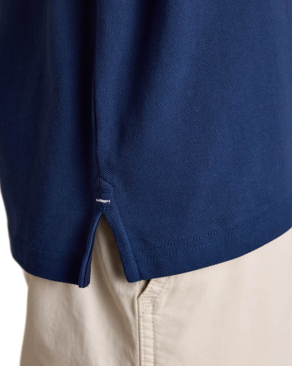 Dark Blue coloured Joules Mens Woody Cotton Pique Polo Shirt on white background 