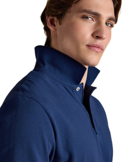 Dark Blue coloured Joules Mens Woody Cotton Pique Polo Shirt on white background 