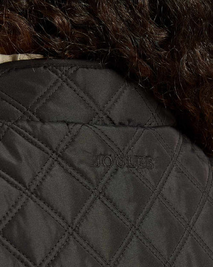 Black Coloured Joules Minx Showerproof Diamond Quilted Gilet on white background 
