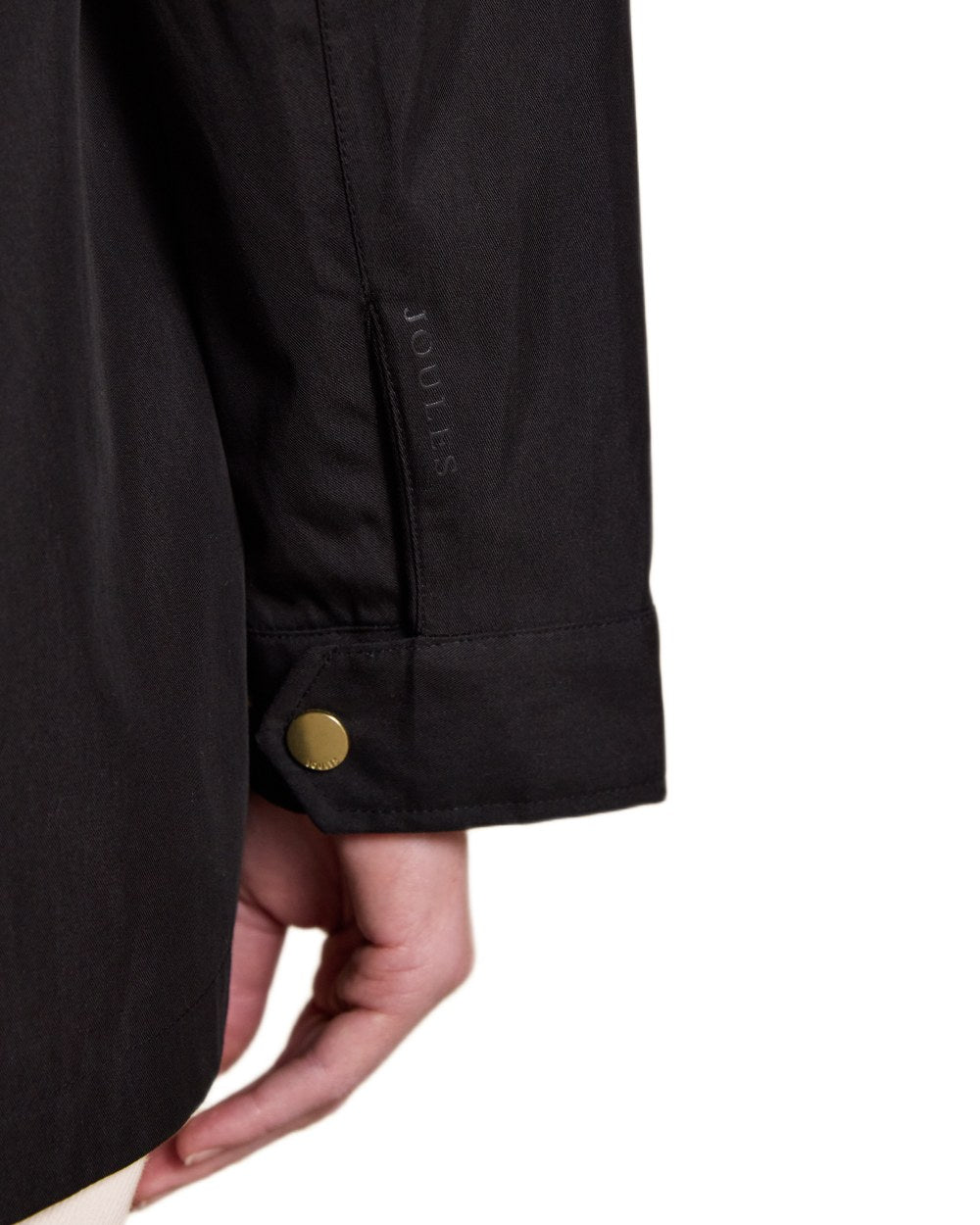 Black Coloured Joules Portwell Waterproof Raincoat With Hood On A White Background 