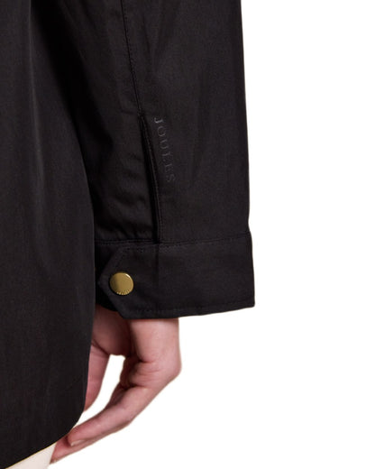Black Coloured Joules Portwell Waterproof Raincoat With Hood On A White Background 