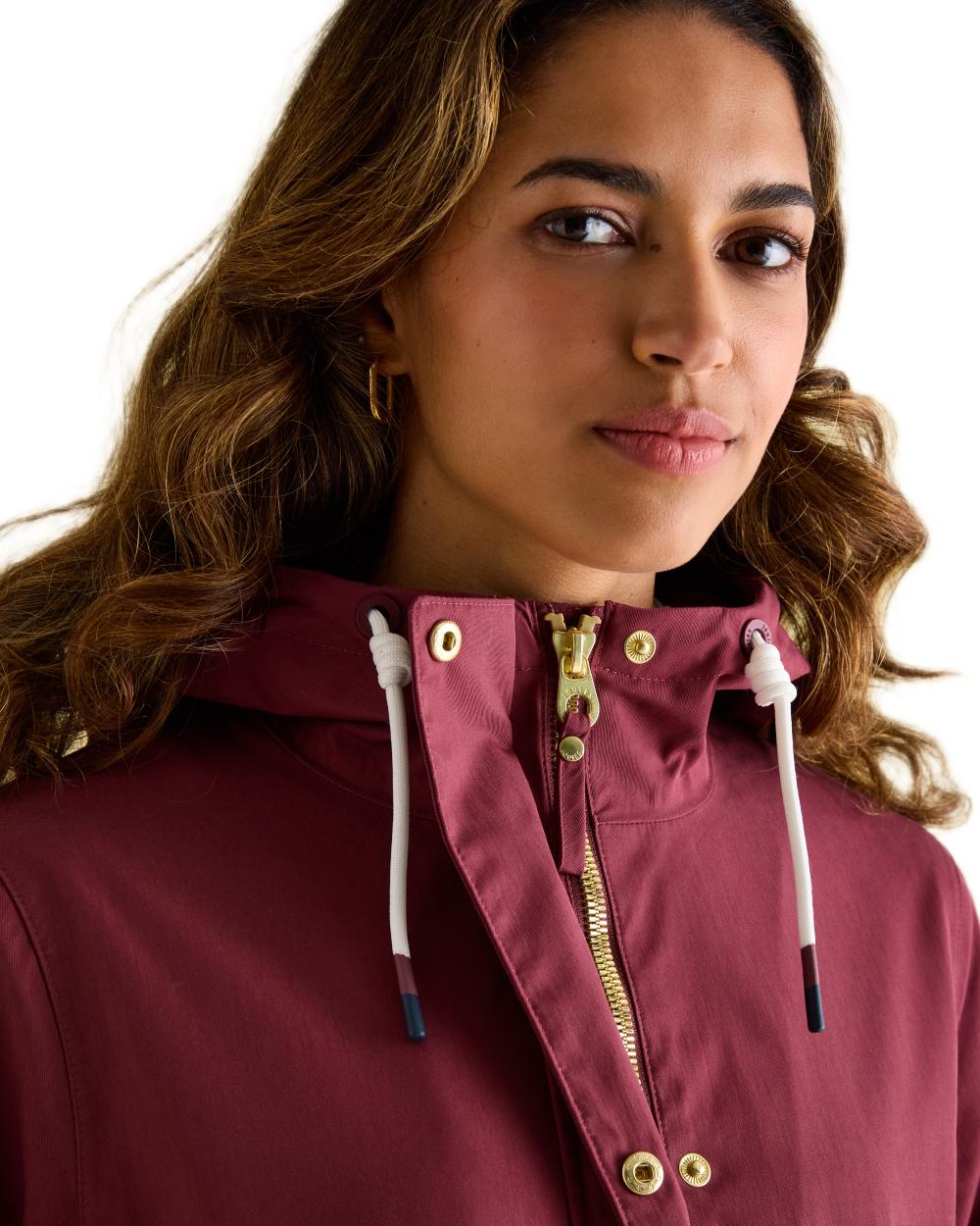 Oxblood Coloured Joules Portwell Waterproof Raincoat With Hood on white background 