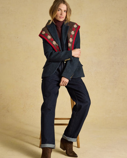 Navy coloured Joules Womens Canterly Tweed Hacking Jacket on indoor background 