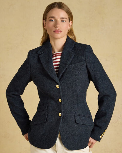 Navy coloured Joules Womens Canterly Tweed Hacking Jacket on indoor background 
