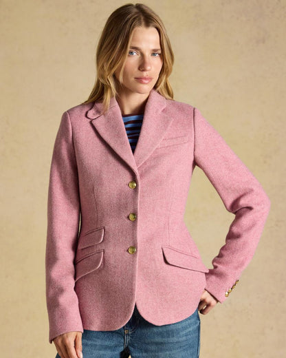 Pink coloured Joules Womens Canterly Tweed Hacking Jacket on wall background 