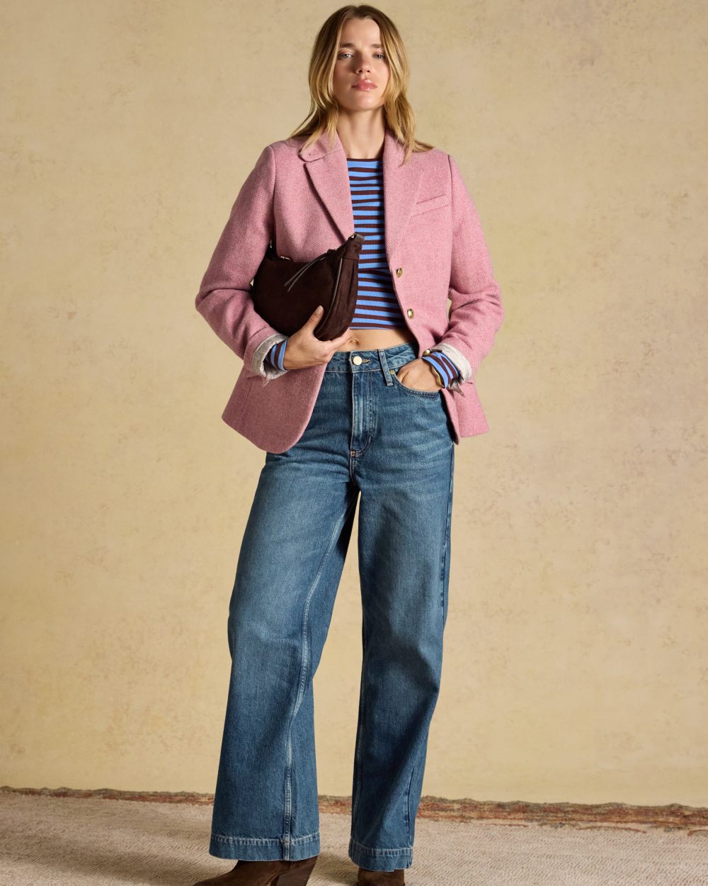 Pink coloured Joules Womens Canterly Tweed Hacking Jacket on wall background 