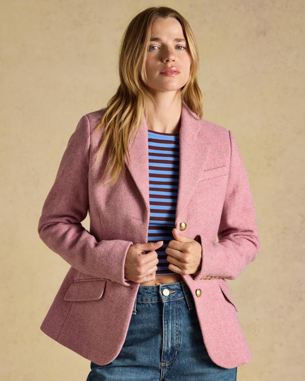 Pink coloured Joules Womens Canterly Tweed Hacking Jacket on wall background 