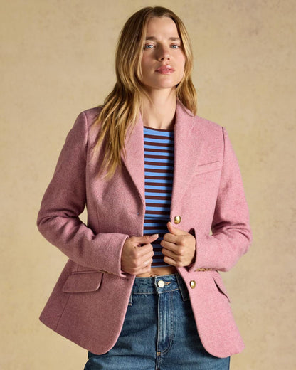 Pink coloured Joules Womens Canterly Tweed Hacking Jacket on wall background 