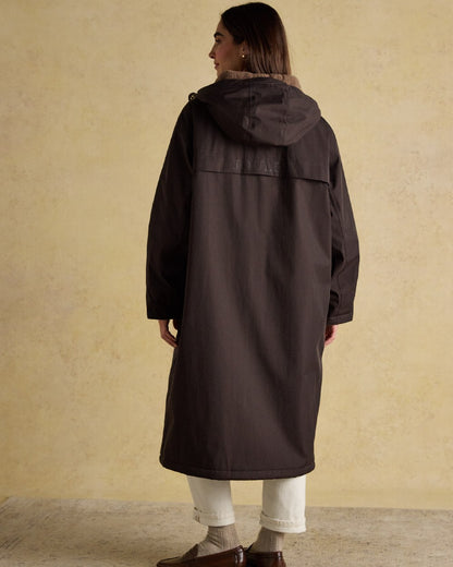 Chocolate Coloured Joules Womens Fleecelined Waterproof Coveralls on indoor background 