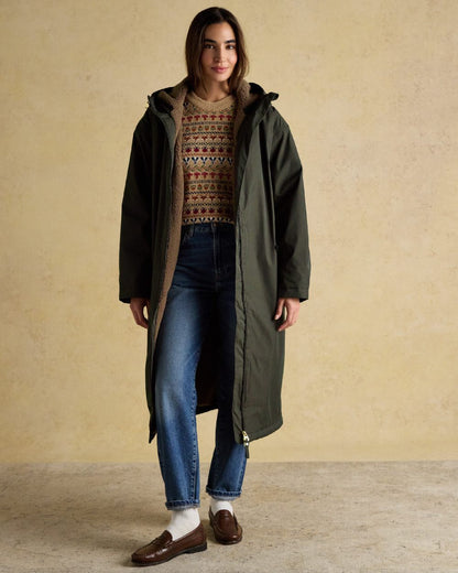 Rosemary Green Coloured Joules Womens Fleecelined Waterproof Coveralls on indoor background 