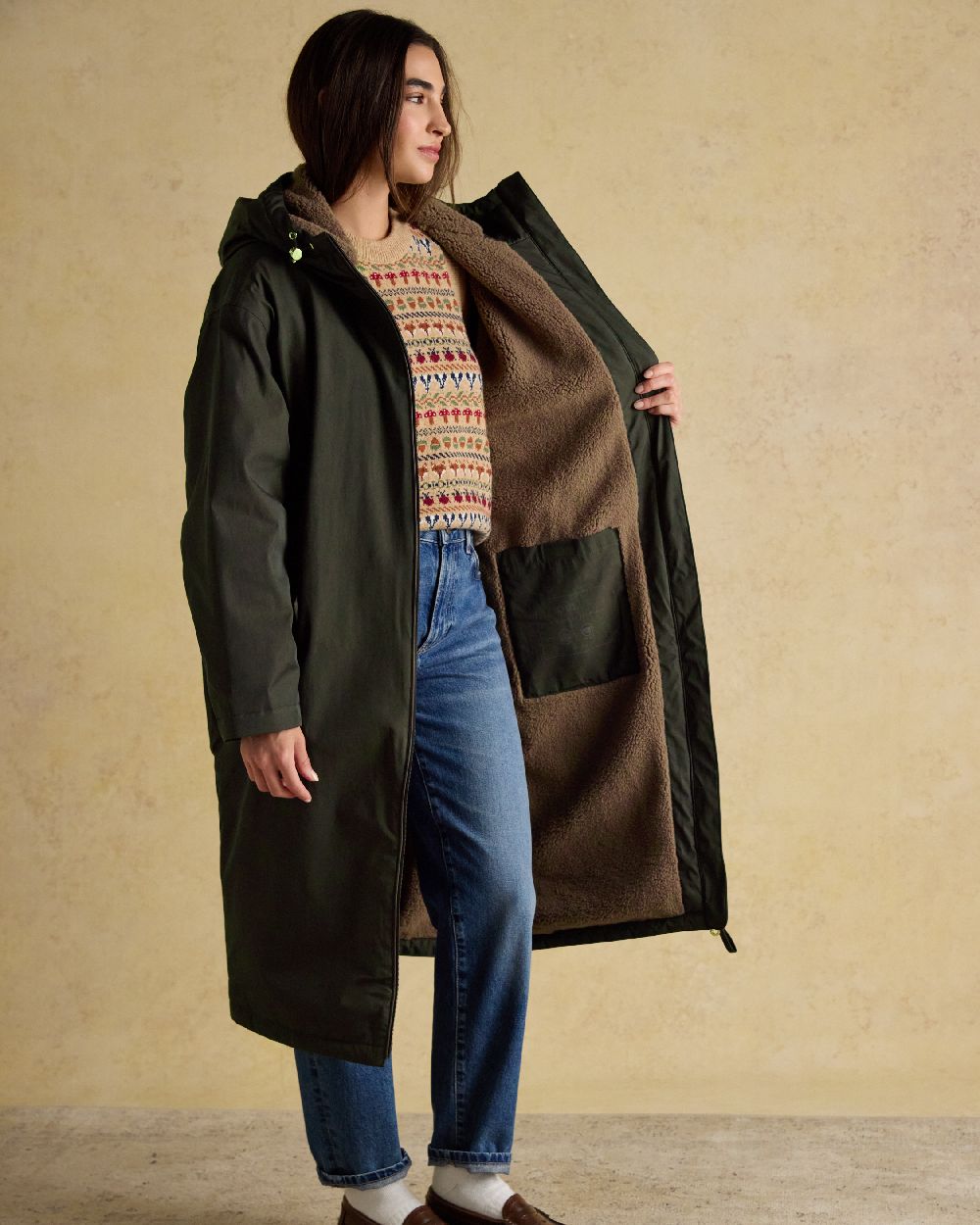 Rosemary Green Coloured Joules Womens Fleecelined Waterproof Coveralls on indoor background 