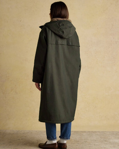 Rosemary Green Coloured Joules Womens Fleecelined Waterproof Coveralls on indoor background 