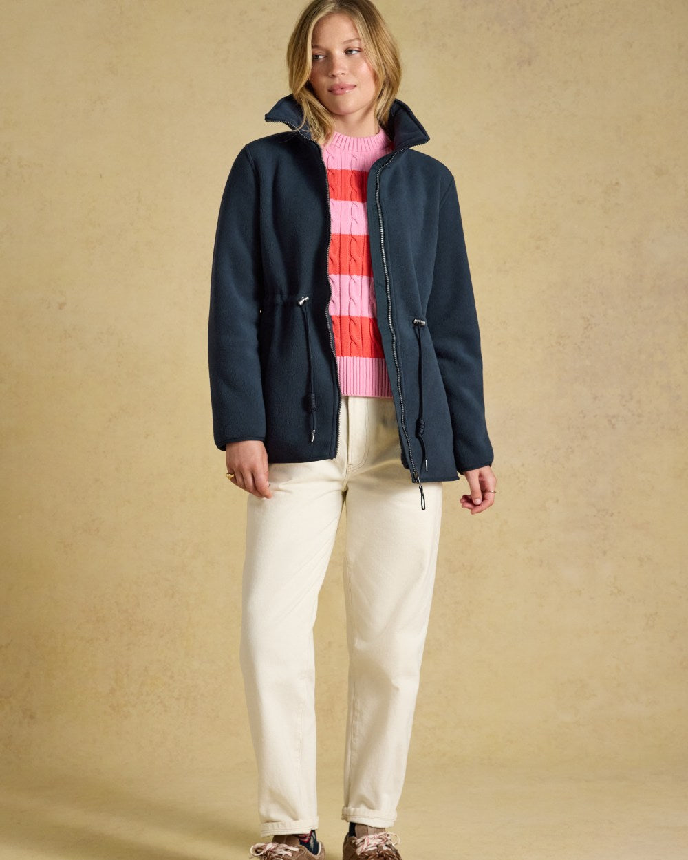 Navy coloured Joules Womens Full Zip Longline Fleece Jacket on indoor background 