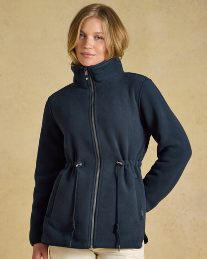 Navy coloured Joules Womens Full Zip Longline Fleece Jacket on indoor background 