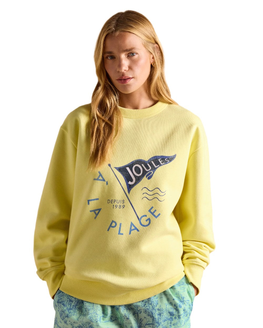 Yellow coloured Joules Womens Graphic Crew Neck Sweatshirt on white background 