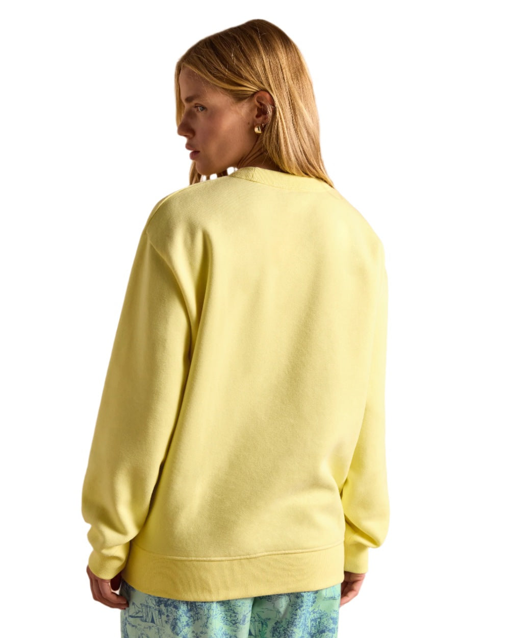 Yellow coloured Joules Womens Graphic Crew Neck Sweatshirt on white background 