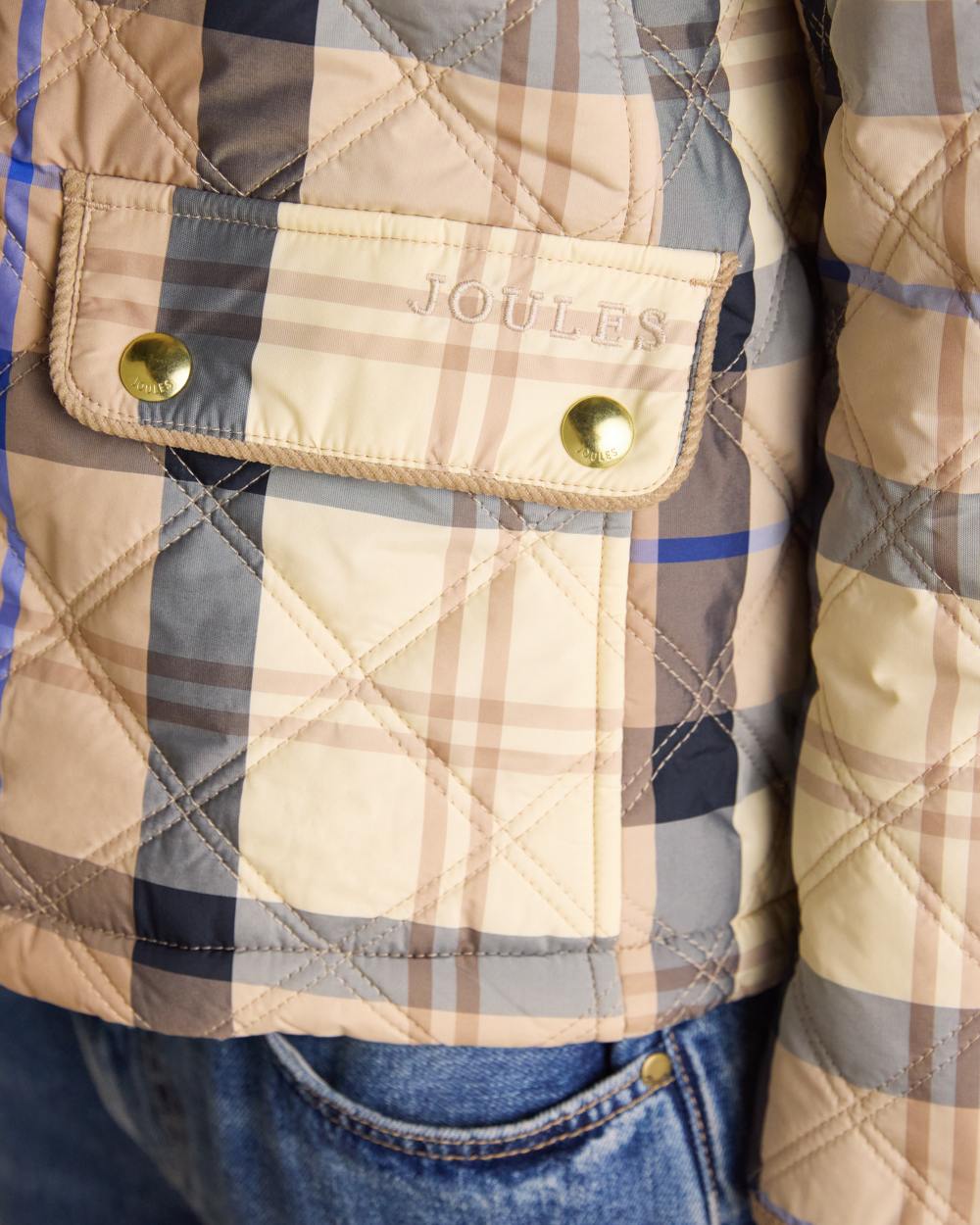 Brown check coloured Joules Womens Harrogate Showerproof Diamond Quilted Barn Jacket on white background 