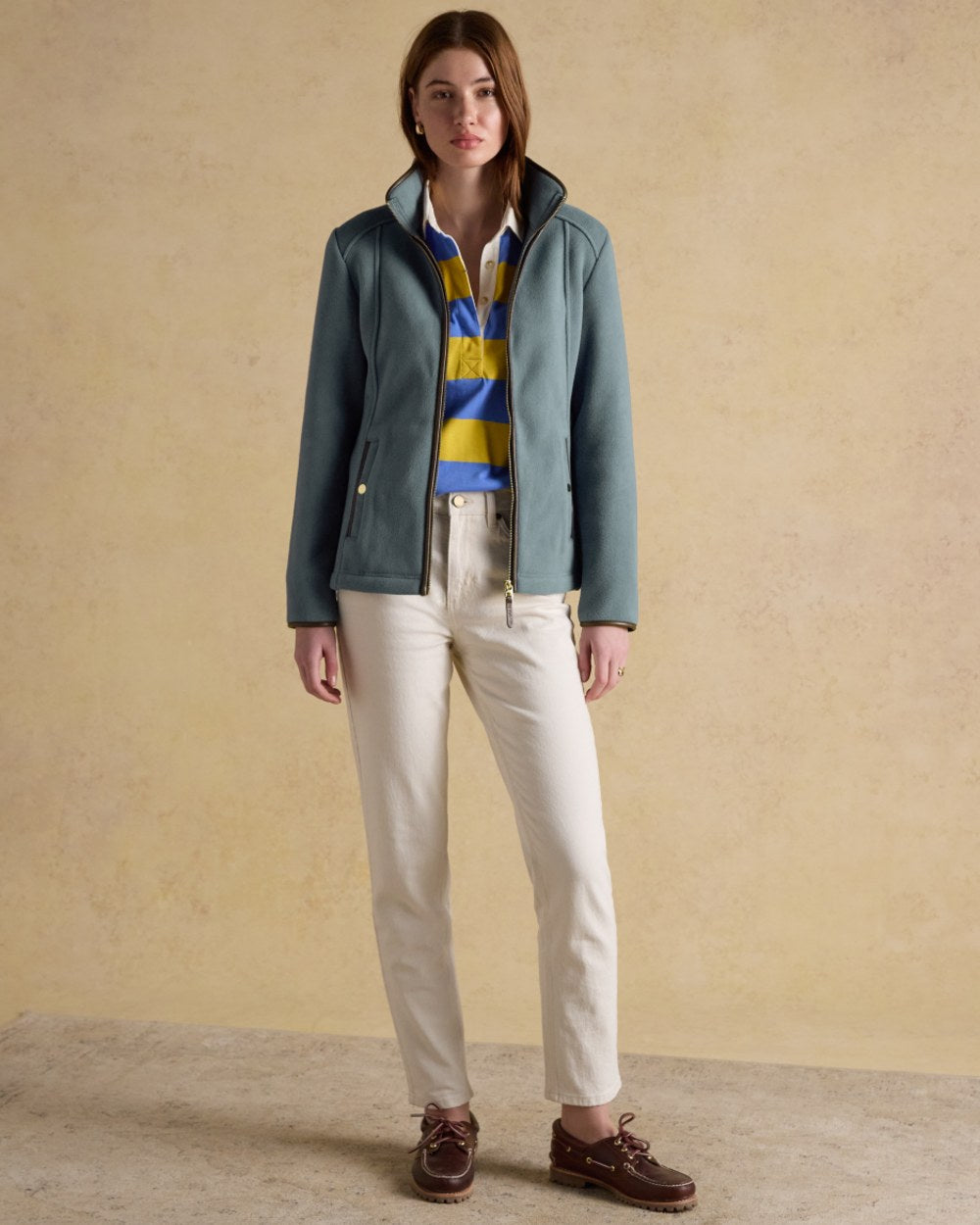 Blue Coloured Joules Womens Heritage Full Zip Through Fleece on wall background 