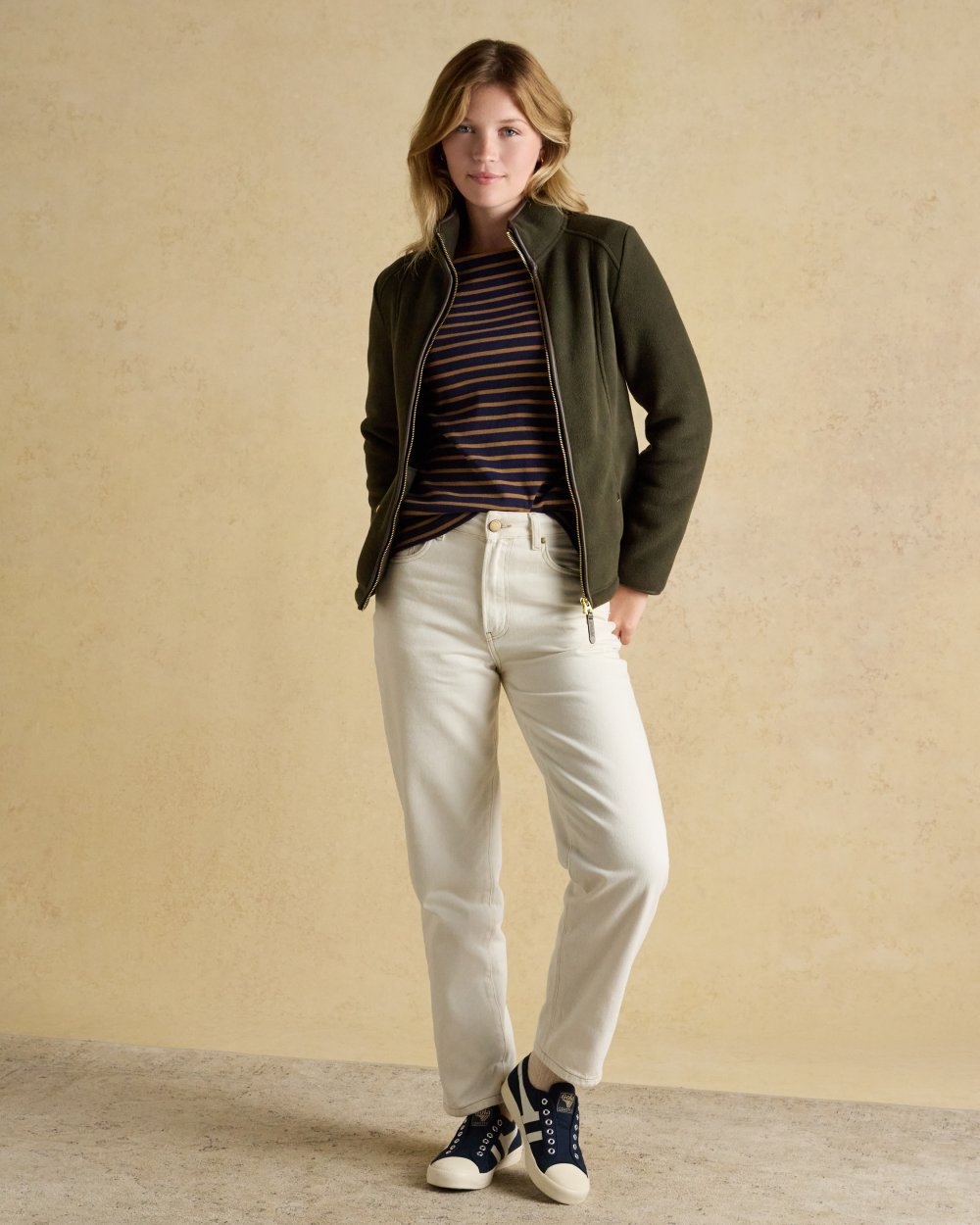 Green Coloured Joules Womens Heritage Full Zip Through Fleece on wall background 