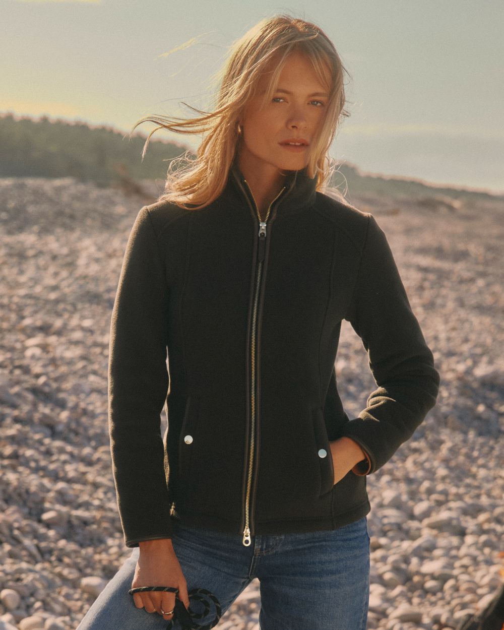 Green Coloured Joules Womens Heritage Full Zip Through Fleece on beach background 