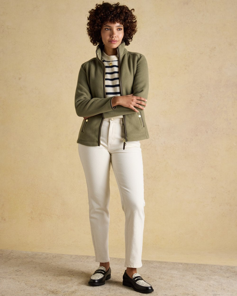 Light Green Coloured Joules Womens Heritage Full Zip Through Fleece on wall background 