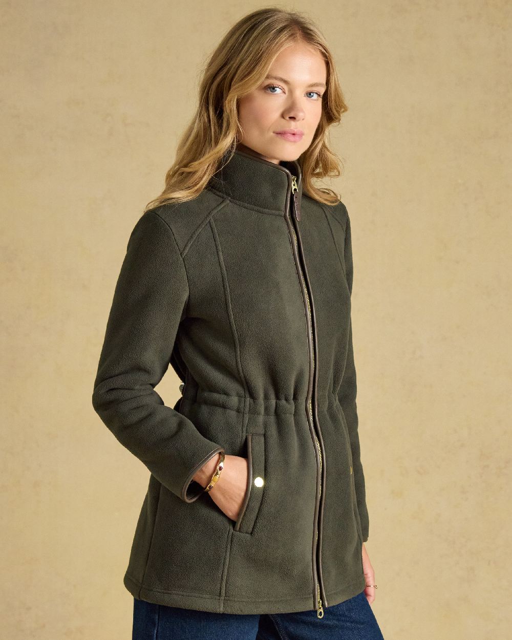 Green Coloured Joules Womens Heritage Longline Jacket on Cream Background 